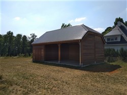 Tuinhuis in hoevestijl met wolfsdak